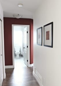 painting an accent wall in a hallway