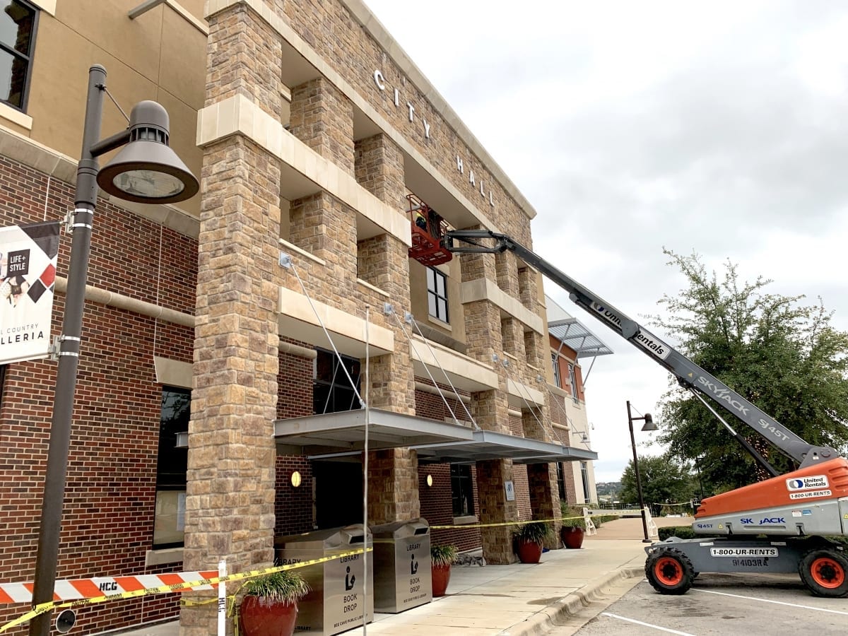 Painting exterior lintels at Bee Cave City Hall