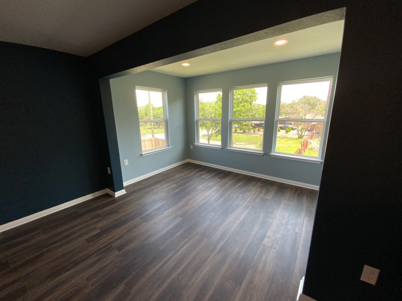 Master Bedroom Sitting Area with dark and light blue walls Master Bedroom Sitting Area with dark and light blue walls