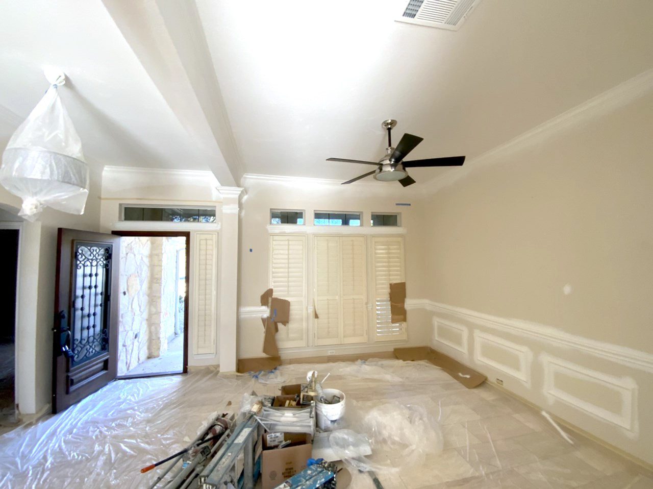 Before – covered floors before painting ceiling Before - covered floors before painting ceiling