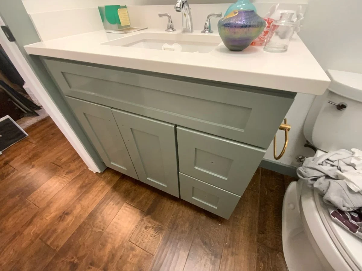 Freshly painted bathroom vanity cabinet
