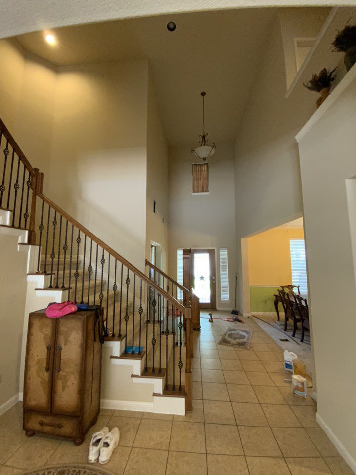 beige walls in entryway and stairwell