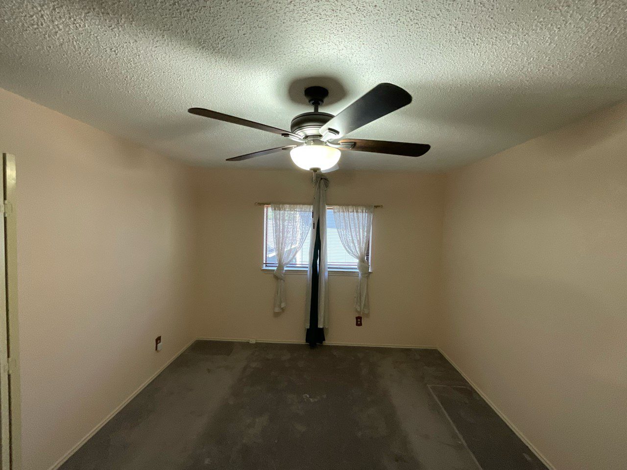 before - bedroom with popcorn ceiling texture